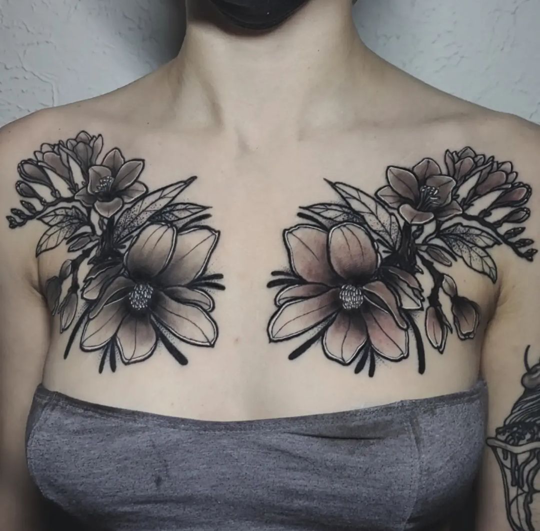 Black and grey florals across the chest